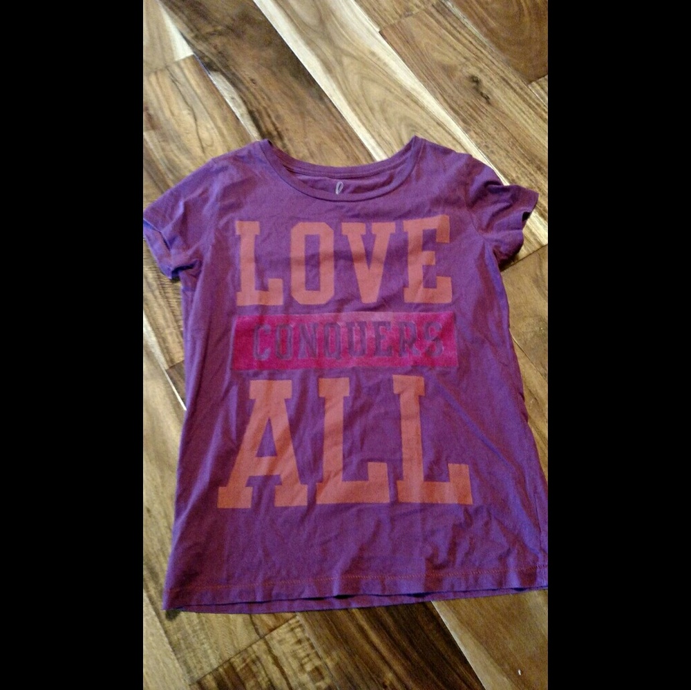 Peek Love Conquers All Tshirt.